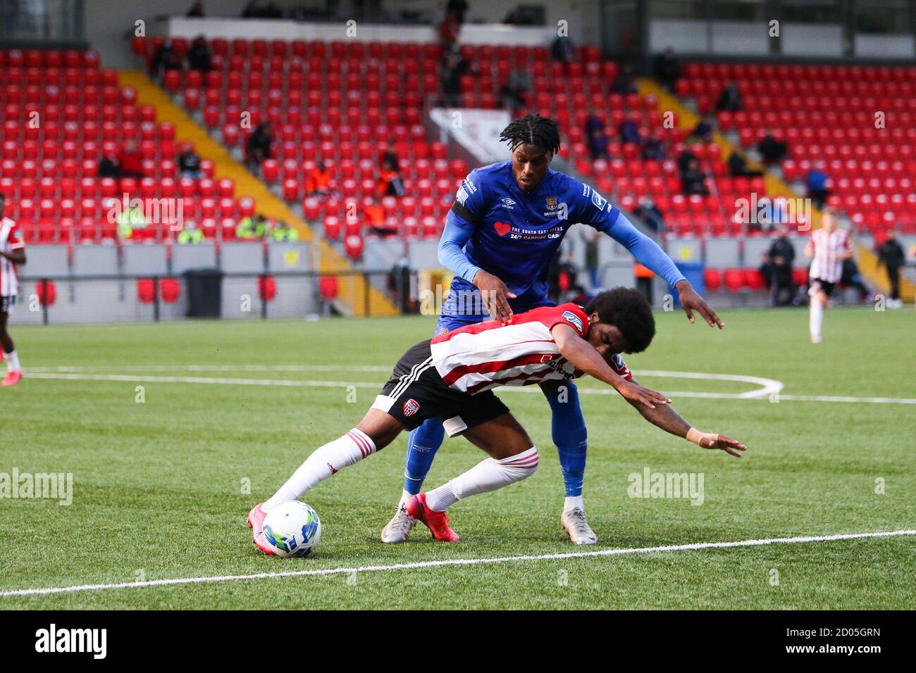 WALTER FIGUEIRA (Derry City FC) goes to ground in the penalty area after Sobowale (Waterford) makes contact   during the Airtricity League fixture bet Stock Photo