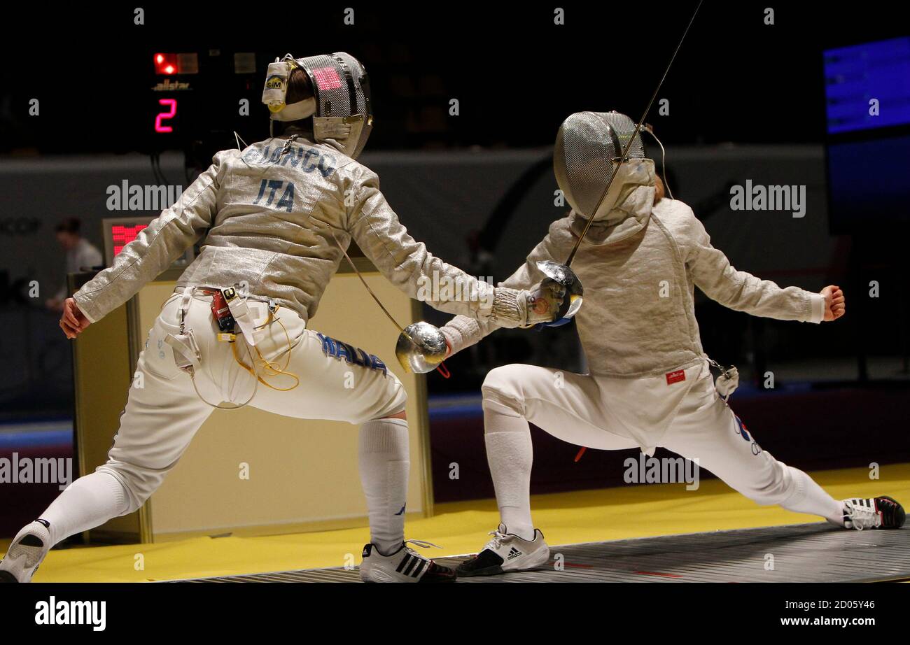 Dyachenko of Russia (R) and Bianco Ilaria of compete during their women's team semi-final at the World Fencing Championships in Kiev April 13, 2012. REUTERS/Gleb Garanich (UKRAINE -