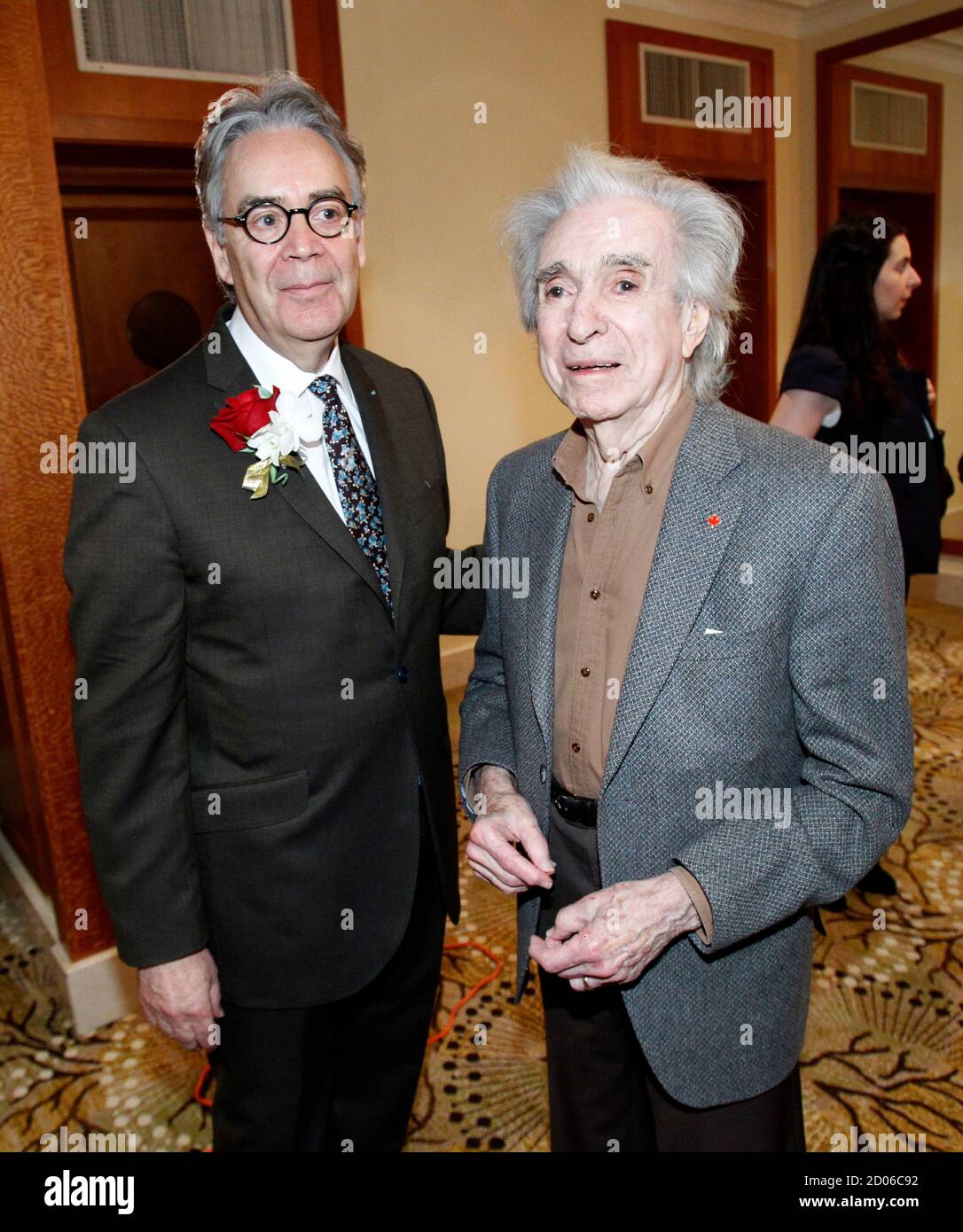 Composer Howard Shore (L), nominated for an Academy Award for Music (Original Score) for 'Hugo,' poses with director Arthur Hiller during a reception to celebrate the Canadian Oscar nominees in Beverly Hills, California February 23, 2012. The Academy Awards will be given out in Hollywood February 26. REUTERS/Mario Anzuoni (UNITED STATES - Tags: ENTERTAINMENT) Stock Photo