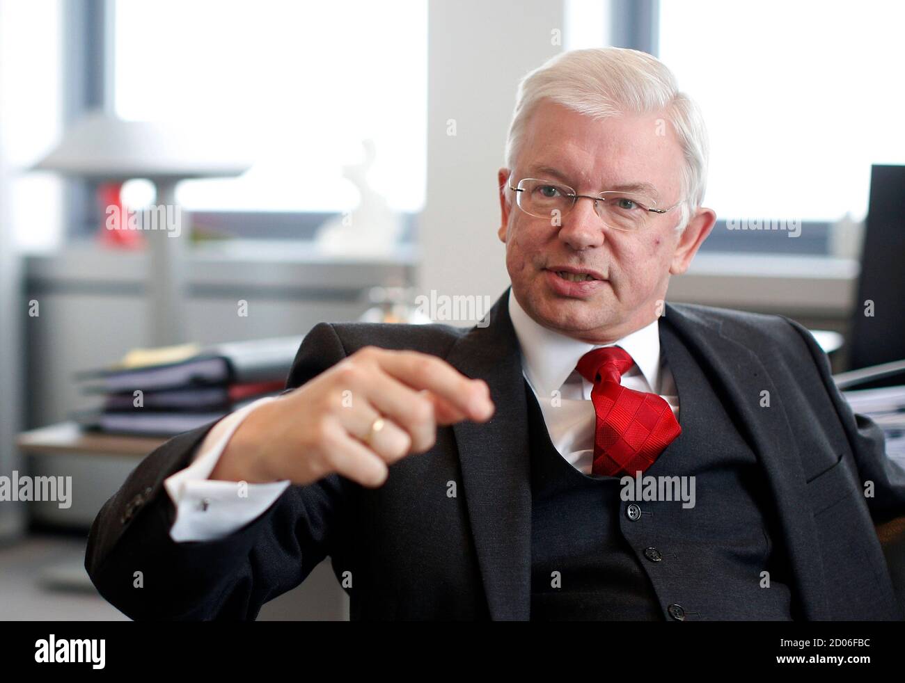 Roland Koch, CEO of German industrial services provider Bilfinger, gestures  during an interview with Reuters in Mannheim January 21, 2013. Koch told  Reuters that he sees no reason why his company should