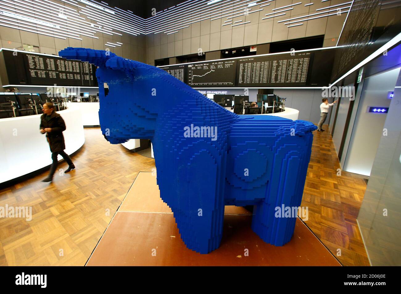 A bull figure made of 210,000 pieces of LEGO bricks, stands in front of the  German share price index DAX board at the German stock exchange in  Frankfurt January 15, 2014. REUTERS/Ralph