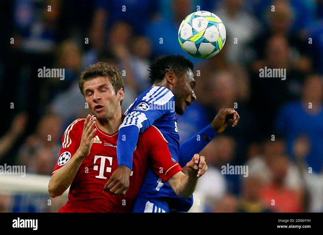 Thomas Mueller (L) of Bayern Munich fights for the ball with Salomon Kalou  of Chelsea during their Champions League final soccer match at the Allianz  Arena in Munich, May 19, 2012. REUTERS/Kai