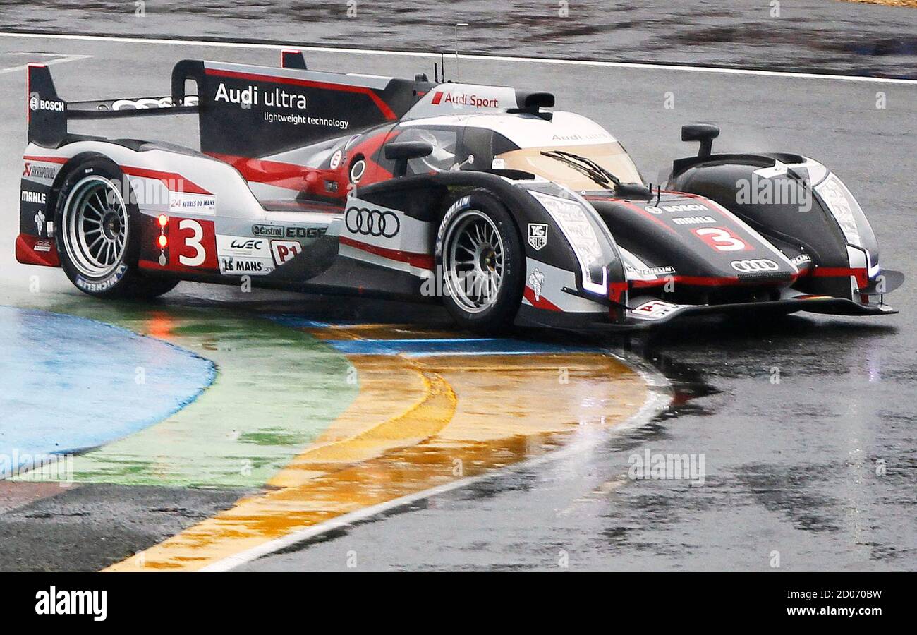 Marc Gene of Spain drives his Audi R18 Ultra LMP1 Number 3 during a warm-up  session before the Le Mans 24-hour sportscar race in Le Mans, central  France June 16, 2012. The
