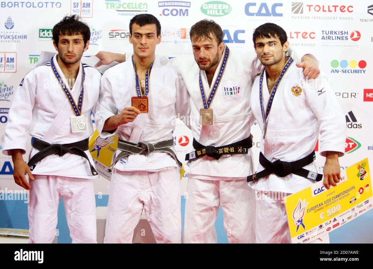 Gold medallist Ukraine's Georgii Zantaraia (2nd L) poses with silver medallist Georgia's Betkil Shukvani (L), bronze medallists Russia's Arsen Galstyan (R) and Italy's Elio Verde (2nd R) during a ceremony for the men's under 60 kg category at the Judo European Championships in Istanbul April 21, 2011. REUTERS/Osman Orsal (TURKEY - Tags: SPORT JUDO) Stock Photo