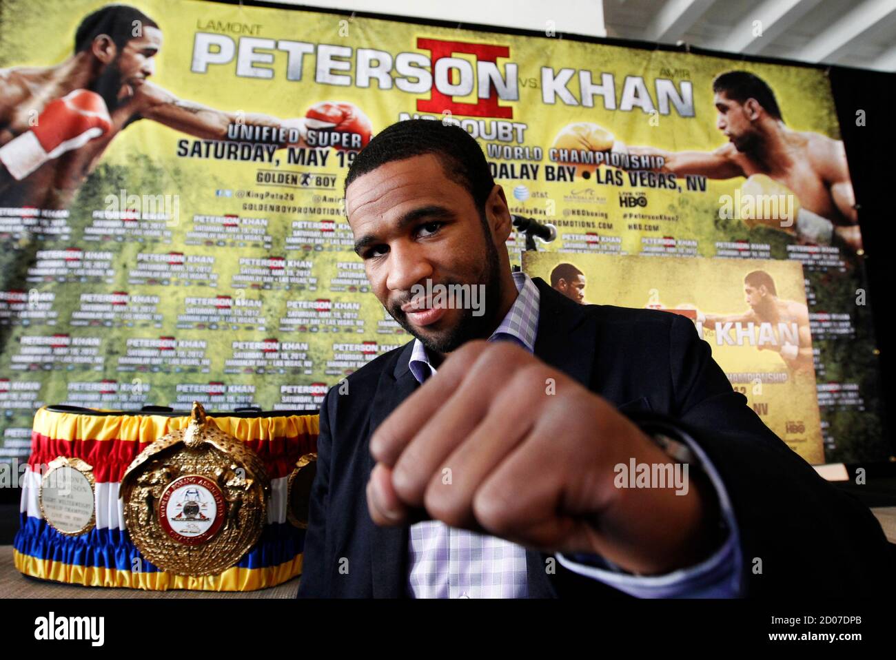 Welterweight boxing champion Lamont Peterson of the U.S. poses during a news conference in Washington March 15, 2012, to announce a rematch with Britain's Amir Khan in May. Khan lost his IBF and WBA light-welterweight titles after a shock defeat to Peterson in a controversial split decision in Washington last December.   REUTERS/Kevin Lamarque (UNITED STATES - Tags: SPORT BOXING) Stock Photo