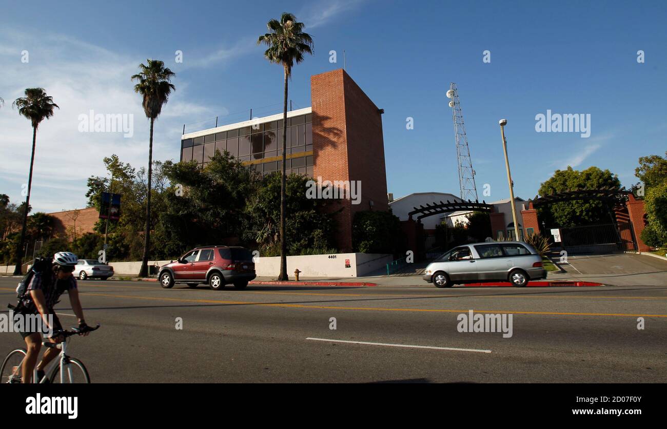 A cyclist passes the building where television station KCET used to be  housed in Los Angeles, California July 10, 2012. The Church of Scientology,  the religion whose followers include actors Tom Cruise