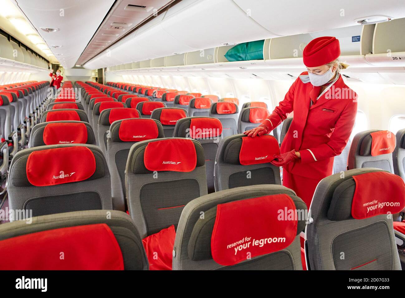Vienna, Austria. 2nd Oct, 2020. A stewardess of Austrian Airlines makes  preparations on a flight to Shanghai at the Vienna International Airport in  Schwechat, Austria, on Oct. 2, 2020. Austrian Airlines resumed