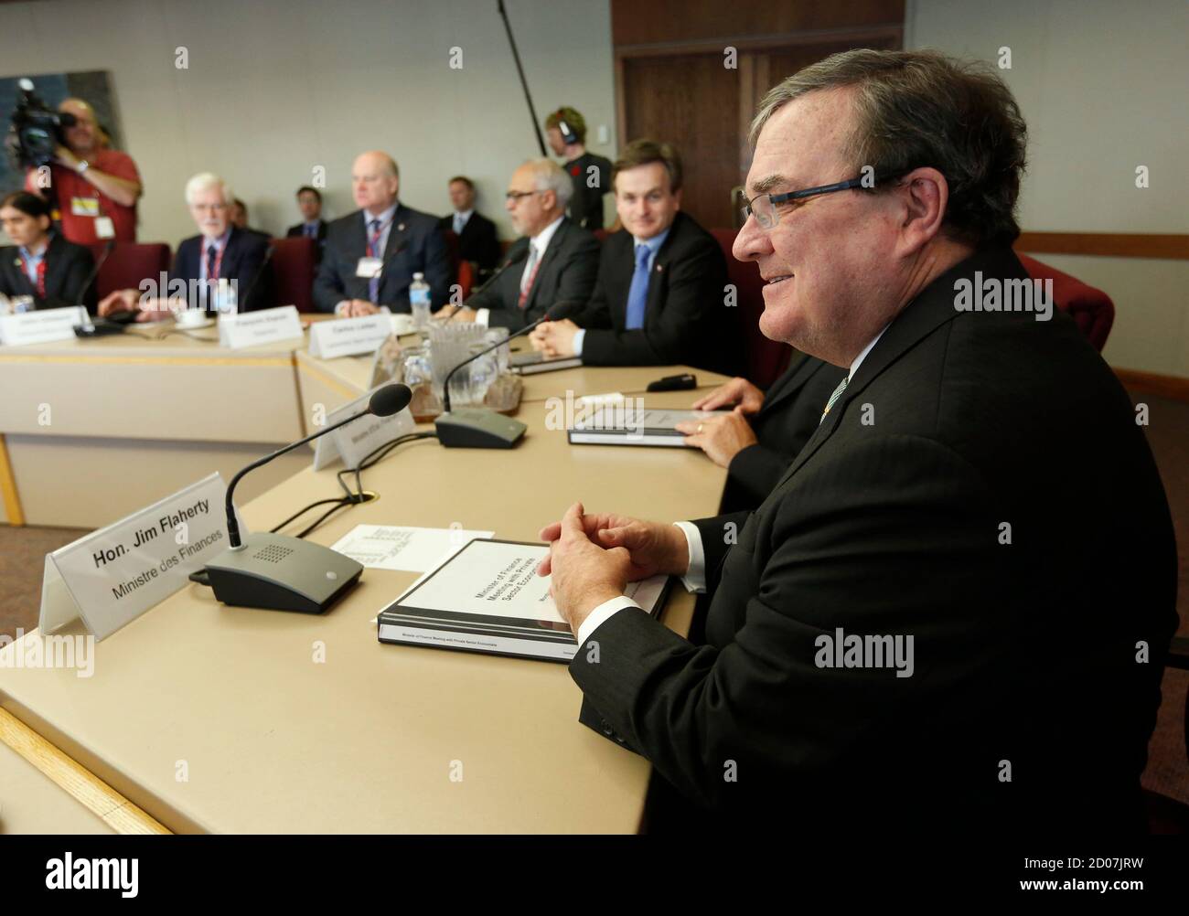 Canada's Finance Minister Jim Flaherty meets with private sector economists in Ottawa October 28, 2013. REUTERS/Chris Wattie (CANADA - Tags: POLITICS BUSINESS) Stock Photo