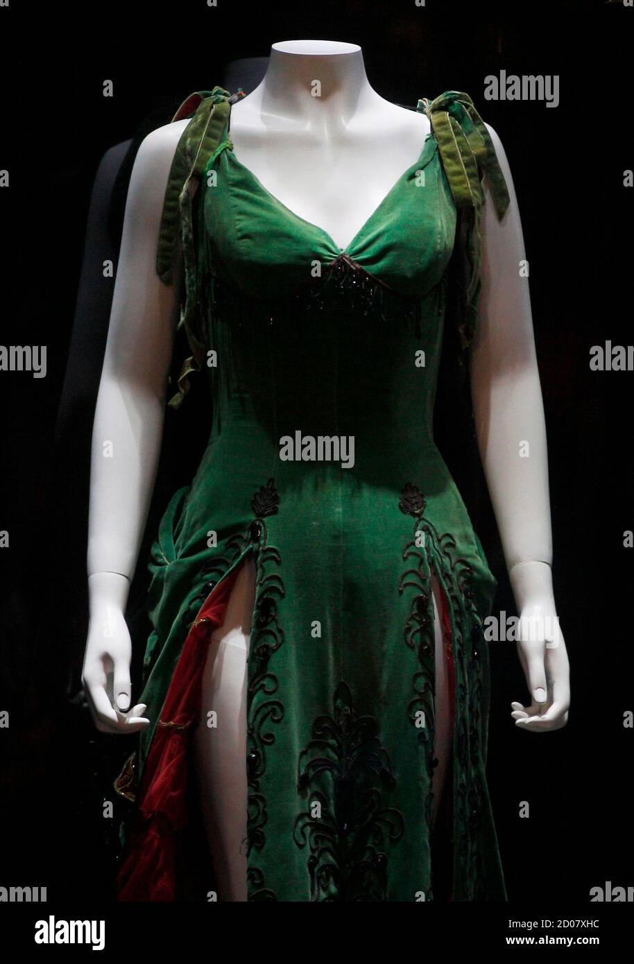 A green velour dress worn by actress Marilyn Monroe in her 1954 film 'River of No Return' is displayed at Julien's Auctions in Macau October 22, 2011. The dress, which is estimated to fetch $200,000- $300,000, will be put up for auction on Saturday with other pop memorabilia. REUTERS/Tyrone Siu (CHINA - Tags: ENTERTAINMENT FASHION SOCIETY) Stock Photo