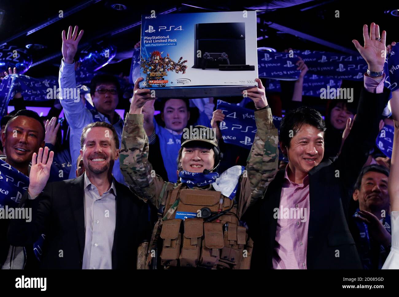 Ryo Watanabe C 21 Holds Up His Playstation 4 Game Console After Being The First In Japan To Own The Gaming Console Next To Sony Computer Entertainment Inc President And Group Ceo