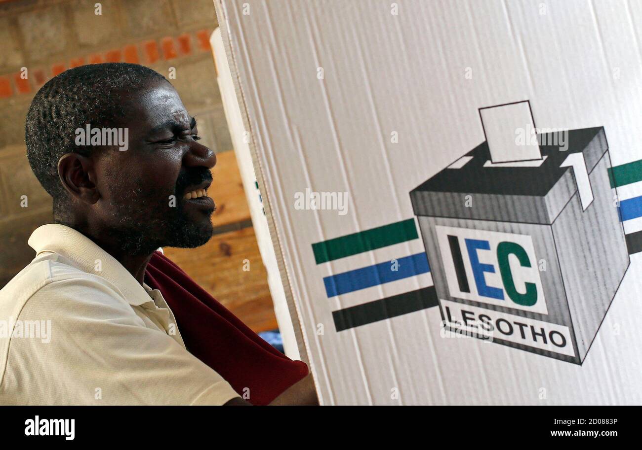 A man reacts as he casts his vote during Lesotho's national elections in Qoaling village, outside the capital Maseru, February 28, 2015. The people of Lesotho voted on Saturday in a tense election they hope will restore stability six months after an attempted coup in the southern African nation. The vote is being held around two years ahead of schedule under a political deal brokered by South African deputy president Cyril Ramaphosa. REUTERS/Siphiwe Sibeko (LESOTHO - Tags: POLITICS ELECTIONS) Stock Photo