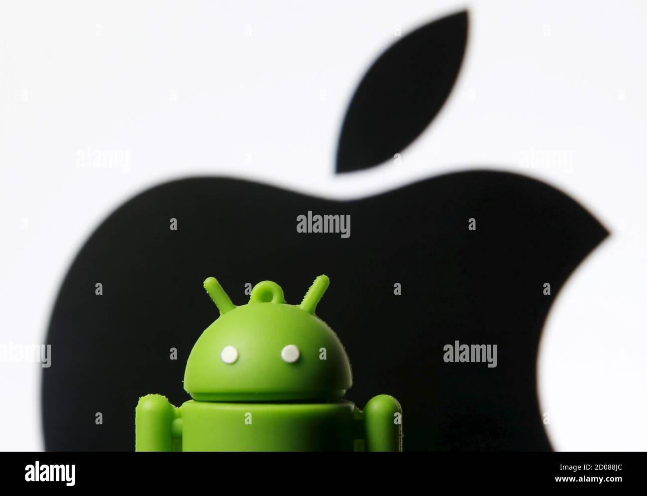 An Android Mascot Is Seen In Front Of A Displayed Logo Of Apple In This Photo Illustration Taken In Zenica Bosnia And Herzegovina May 5 15 A U S Appeals Court On May