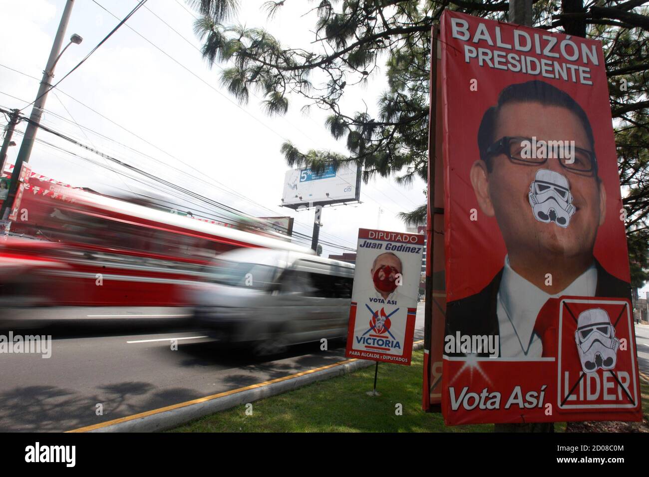 The poster of Guatemala's Libertad Democratica Renovada (LIDER)  presidential candidate Manuel Baldizon is defaced with images of characters  from the movie "Star Wars" in Guatemala city September 8, 2011. Guatemala  will elect