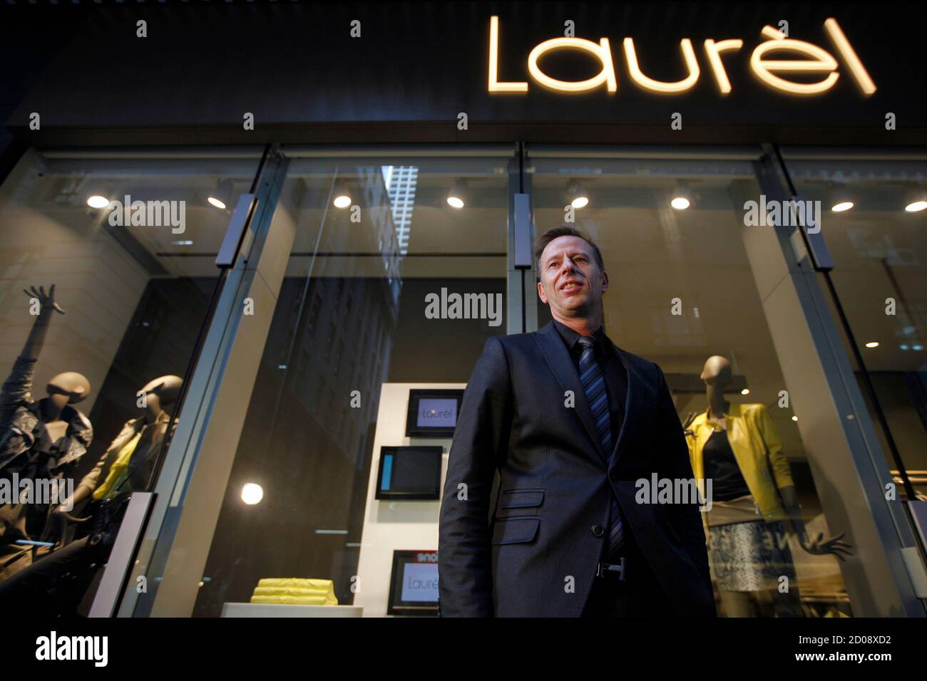 Dirk Reichert, managing director of Laurel, poses for photos after an  interview at Laurel Store before its opening in the financial Central  district of Hong Kong December 8, 2011. Privately-held luxury German