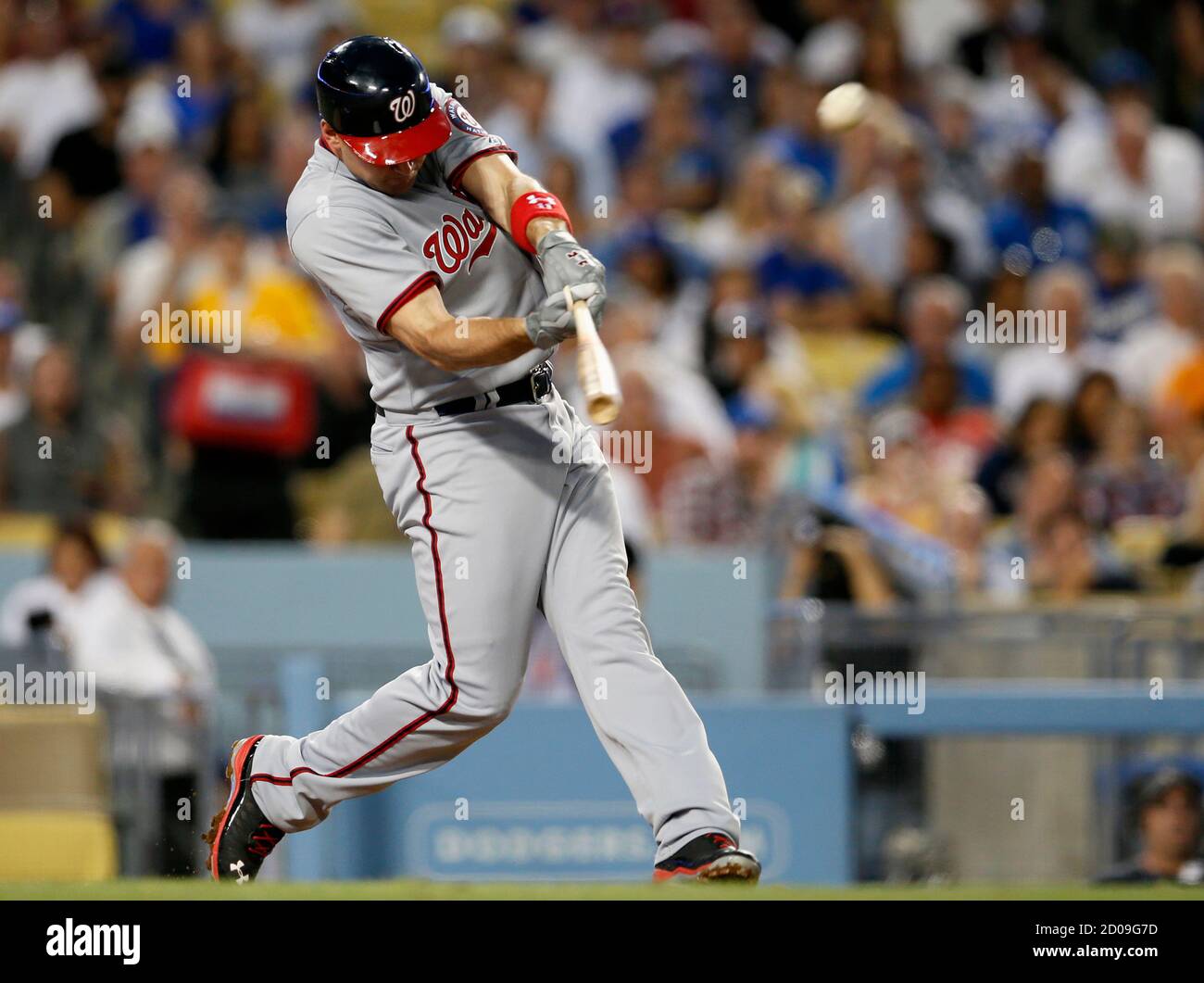 Washington Nationals' Ryan Zimmerman hits a 2RBI double to score Stephen Lombardozzi and Jordan Zimmermann against the Los Angeles Dodgers during the third inning of their MLB National League baseball game in Los Angeles, California May 13, 2013. REUTERS/Lucy Nicholson (UNITED STATES - Tags: SPORT BASEBALL) Stock Photo