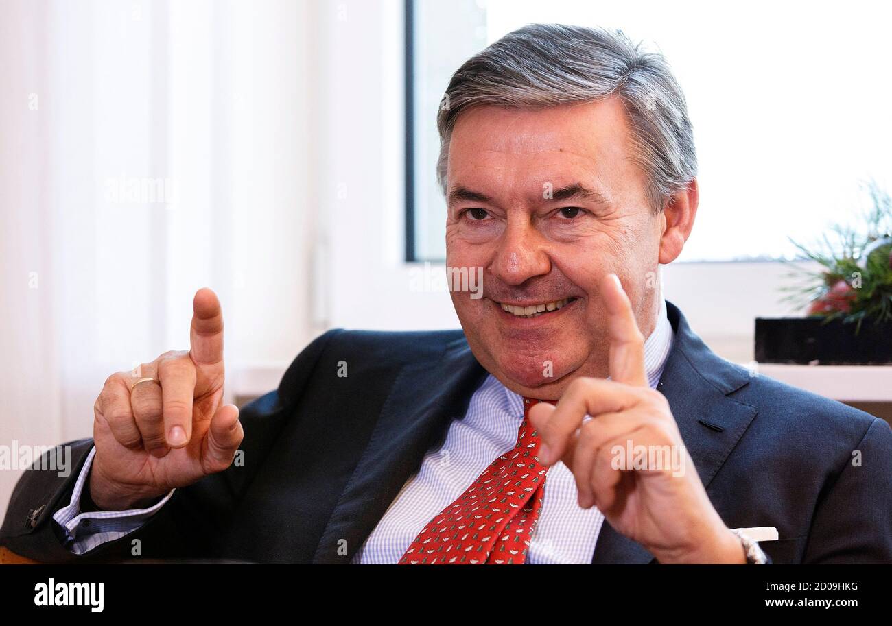 Michael Behrendt, chief executive of German tour operator Hapag-Lloyd, gestures during a Reuters exclusive interview in Hamburg December 6, 2013. German shipping company Hapag-Lloyd's merger talks with Chile's Vapores may herald further deals with other peers, Behrendt said, as the group strives to catch up with the industry's top three players. Hapag-Lloyd, the world's No.5 container shipping company by capacity, last week said it was in talks to merge with smaller Chilean shipper Compania Sud Americana de Vapores, adding that no agreement had yet been reached.    REUTERS/Morris Mac Matzen (G Stock Photo