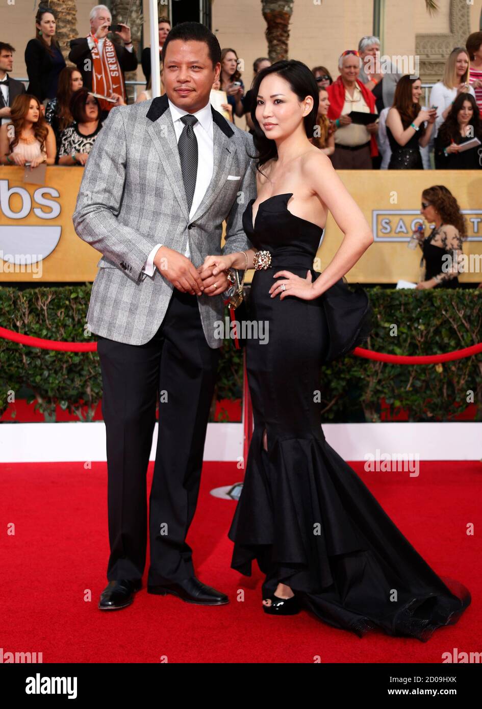 Actor Terrence Howard and wife Miranda arrive at the 20th annual Screen Actors Guild Awards in Los Angeles, California January 18, 2014.  REUTERS/Lucy Nicholson  (UNITED STATES Tags: ENTERTAINMENT)(SAGAWARDS-ARRIVALS) Stock Photo