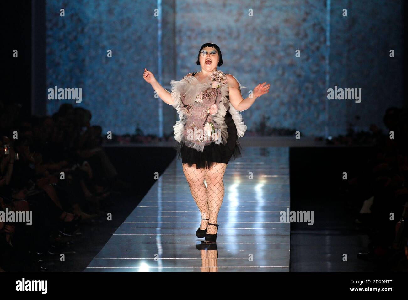 Singer Beth Ditto of U.S. band Gossip presents a creation French designer Jean-Paul Gaultier as part of his Spring/Summer 2011 fashion show in Paris October 2, 2010. REUTERS/Benoit Tessier (FRANCE -