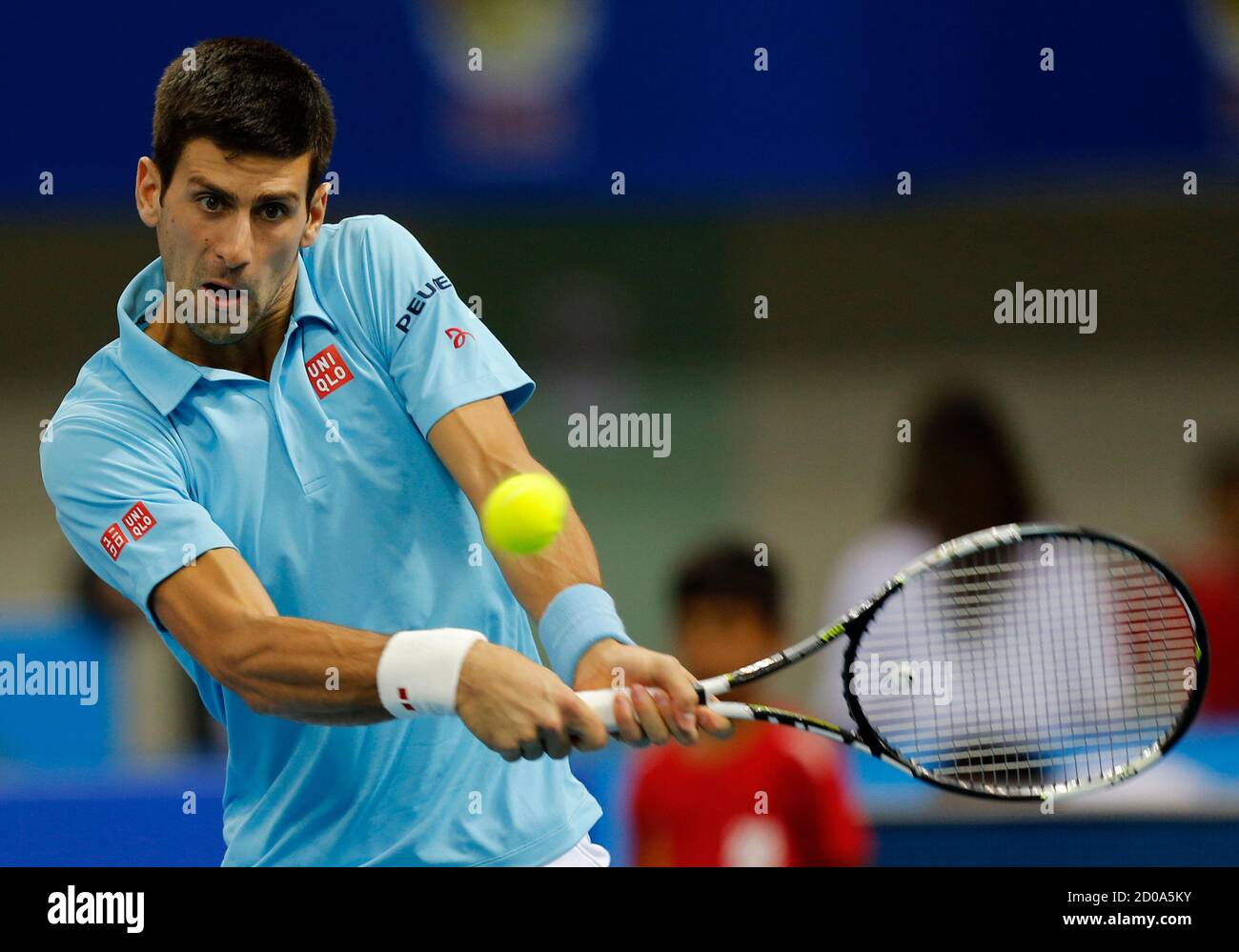 UAE Royals' Novak Djokovic of Serbia hits a return to Indian Aces' Gael  Monfis of France during their match at the International Premier Tennis  League (IPTL) in Dubai December 13, 2014. REUTERS/Ahmed
