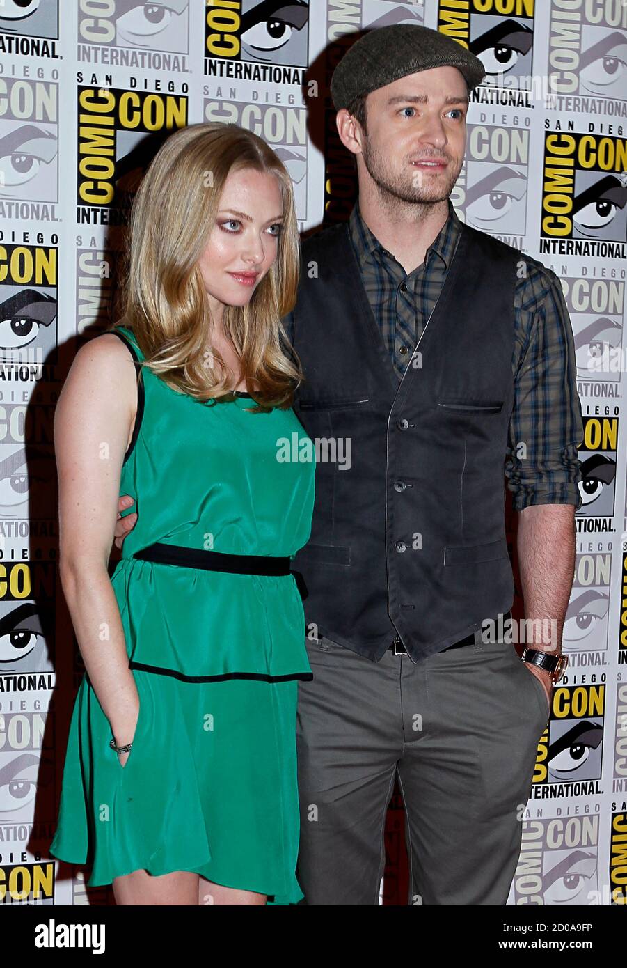 Cast Members Justin Timberlake R And Amanda Seyfried Pose For A Picture To Promote Their Upcoming Motion Picture In Time At Comic Con In San Diego California July 21 11 Reuters Mike Blake