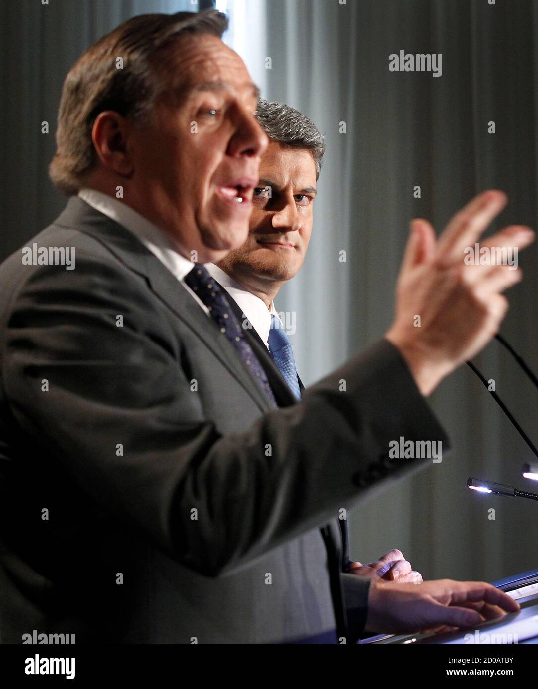 Coalition Avenir Quebec Caq Leader Francois Legault L Speaks While Action Democratique Du Quebec Leader Gerard Deltell R Listens During A News Conference At The Hilton Hotel In Quebec City December 13