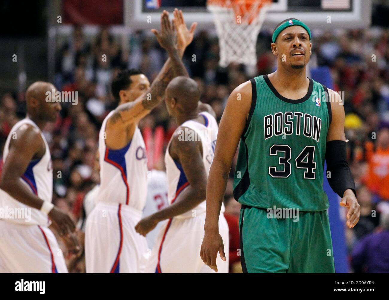 Boston Celtics Paul Pierce R Walks To His Bench As Los Angeles Clippers Lamar Odom L Matt Barnes 2nd L And Jamal Crawford 3rd L Celebrate During A Stop In Play In
