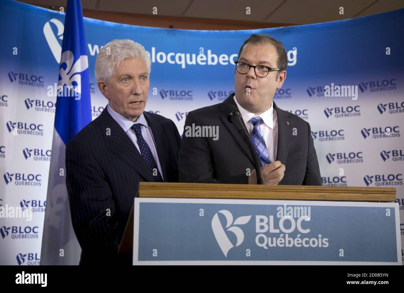 Mario Beaulieu (R) announces Gilles Duceppe's return to federal politics as leader of the Bloc Quebecois, in Montreal June 10, 2015.  REUTERS/Christinne Muschi Stock Photo