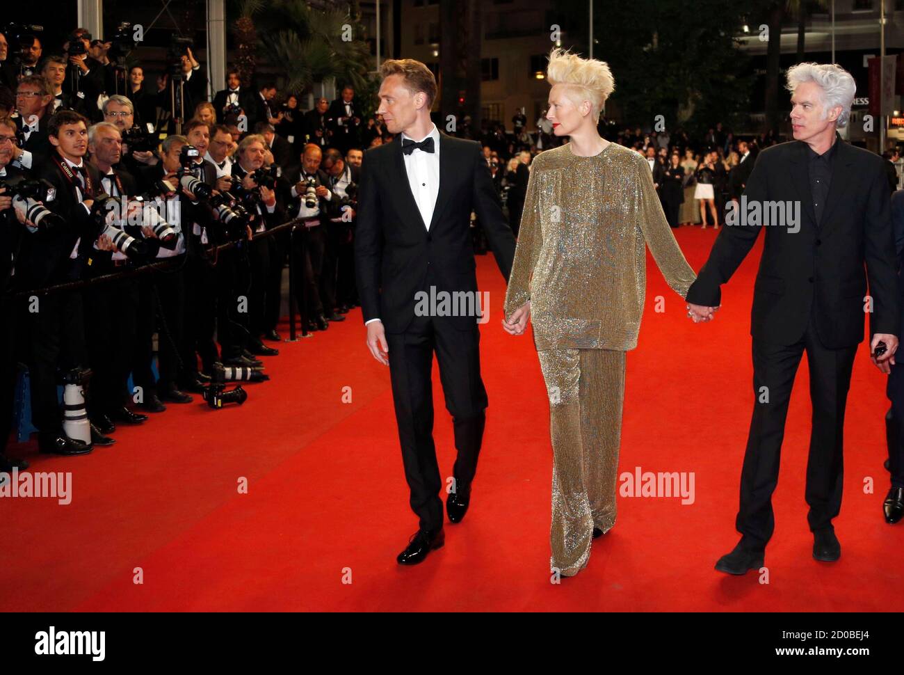 L R Cast Members Tom Hiddleston Tilda Swinton And Director Jim Jarmusch Pose On The Red Carpet As They Arrive For The Screening Of The Film Only Lovers Left Alive In Competition During L R Cast Members Tom Hiddleston Tilda Swinton And Director Jim Jarmusch Pose On The Red Carpet As They Arrive For The Screening Of The Film Only Lovers Left Alive In Competition During