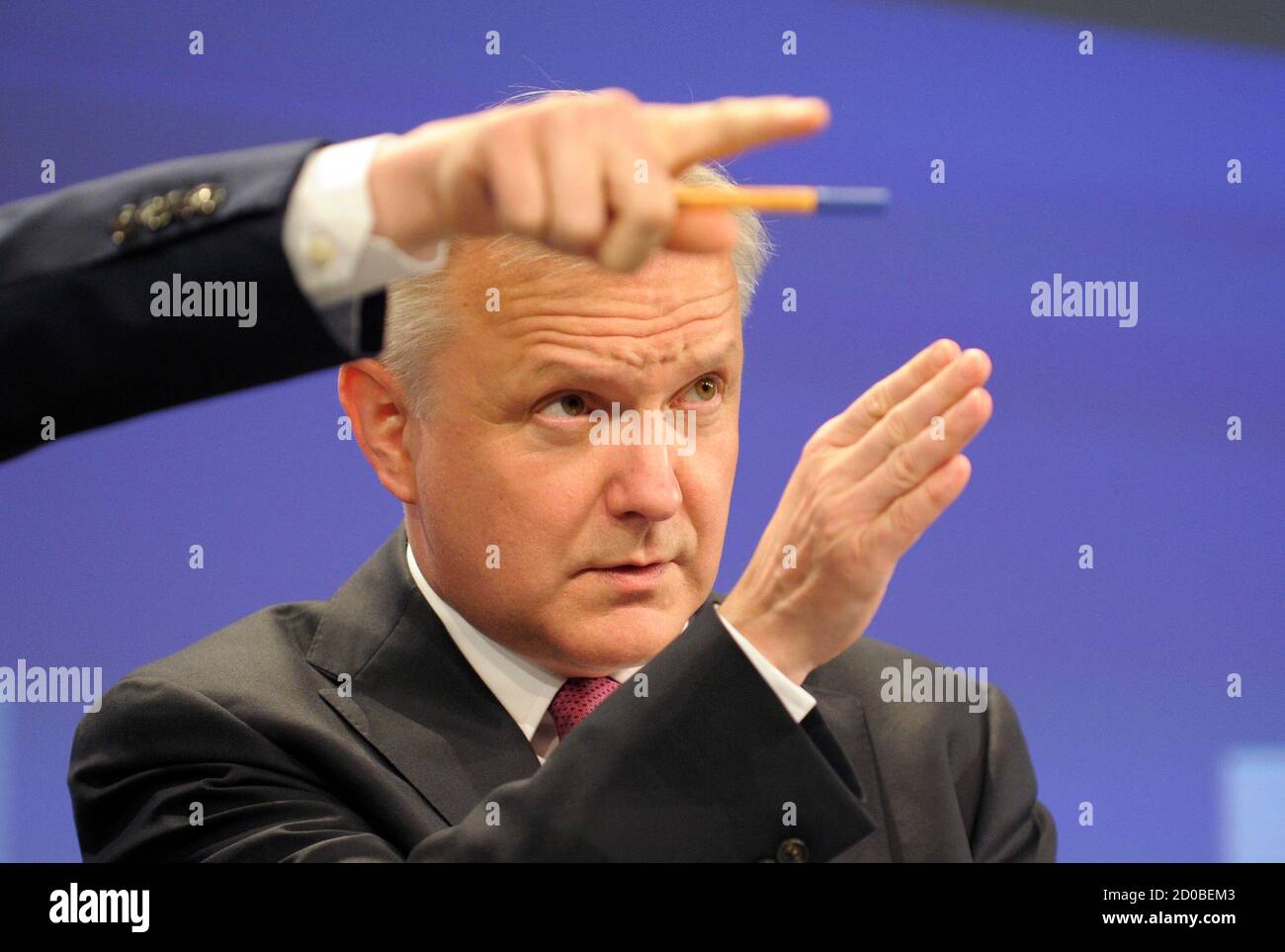 European Economic and Monetary Affairs Commissioner Olli Rehn attends a news conference about the convergence report for Latvia at the European Commision in Brussels June 5, 2013.   REUTERS/Laurent Dubrule    (BELGIUM - Tags: POLITICS BUSINESS) Stock Photo