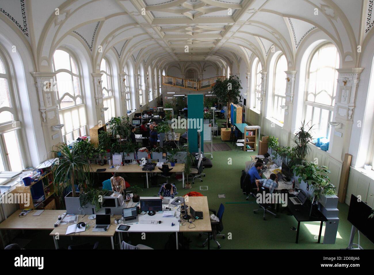Employees work in the Prezi office in Budapest April 16, 2014.   company , which makes online tools for creating  presentations, has raised $57 million in financing from . venture  capital firm