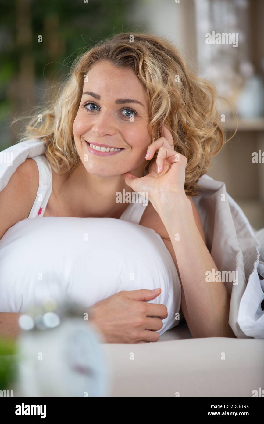 woman-waking-up-with-a-smile-stock-photo-alamy