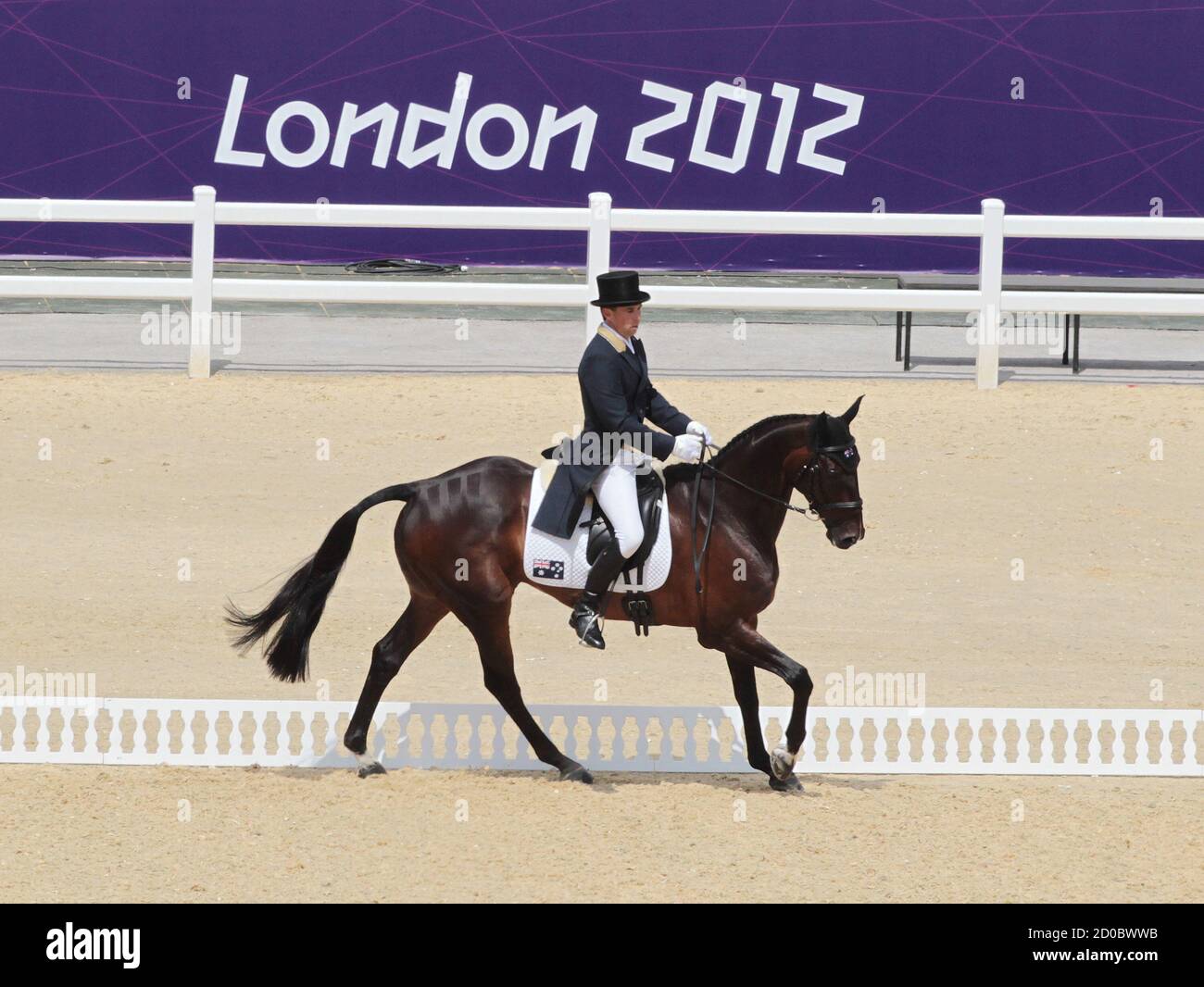 New Zealand rider Sam Griffiths and his horse Happy Times compete in the Eventing Individual Dressage at the Olympic equestrian arena in Greenwich Park during the London 2012 Olympic Games July 28, 2012. REUTERS/Olivia Harris (BRITAIN - Tags: SPORT EQUESTRIANISM OLYMPICS) Stock Photo