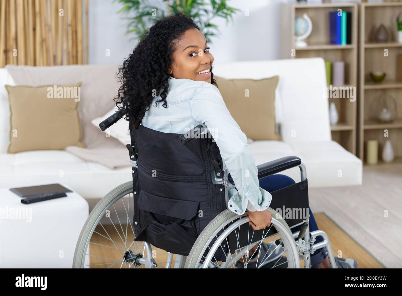 portrait of a happy young woman in a wheelchair Stock Photo - Alamy