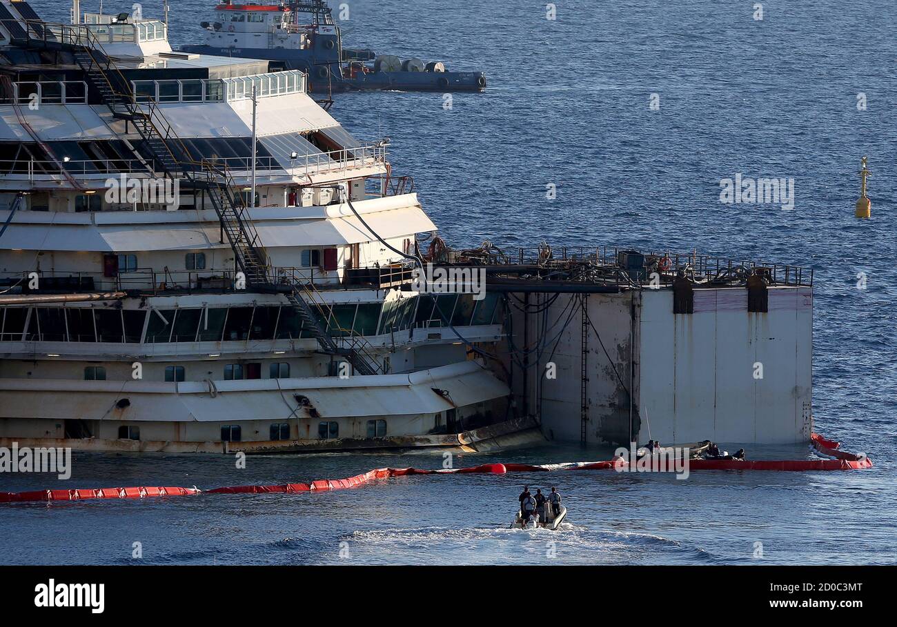 The Cruise Liner Costa Concordia Is Seen At Giglio Harbour Ahead Of It Being Towed Away July 15 2014 The Wreck Of The Luxury Liner Costa Concordia Was Refloated On Monday And