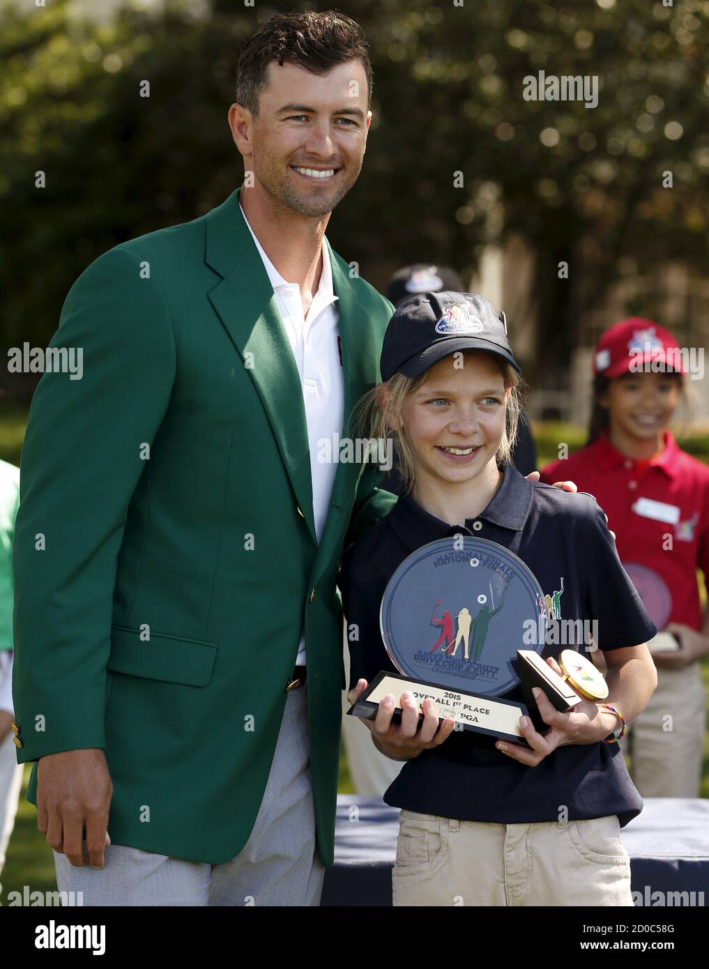 Masters champion Adam Scott poses for a picture with Lydia Swan of ...