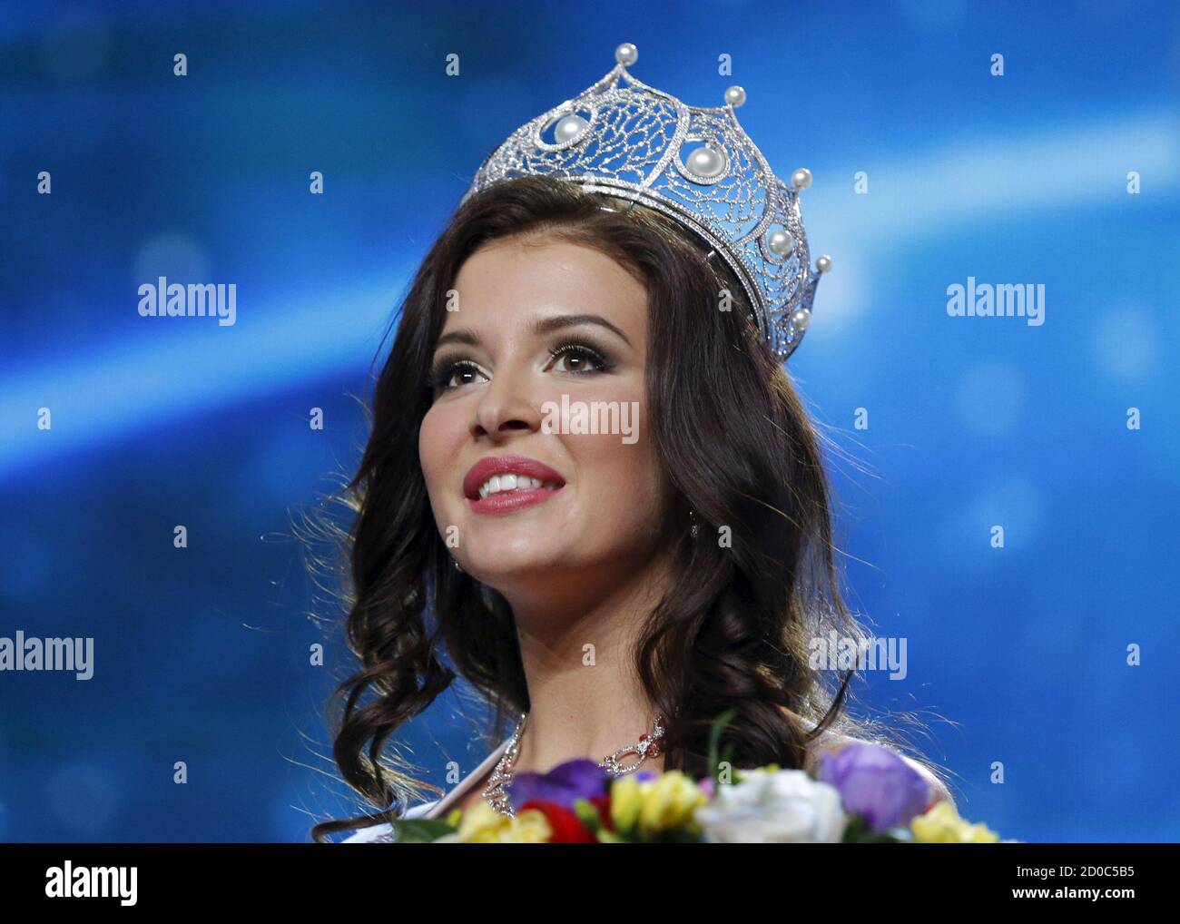Sofia Nikitchuk from Yekaterinburg reacts after winning the annual national  "Miss Russia" beauty pageant at the Barvikha Luxury Village Concert Hall  outside Moscow April 18, 2015. The contest has exclusive rights to
