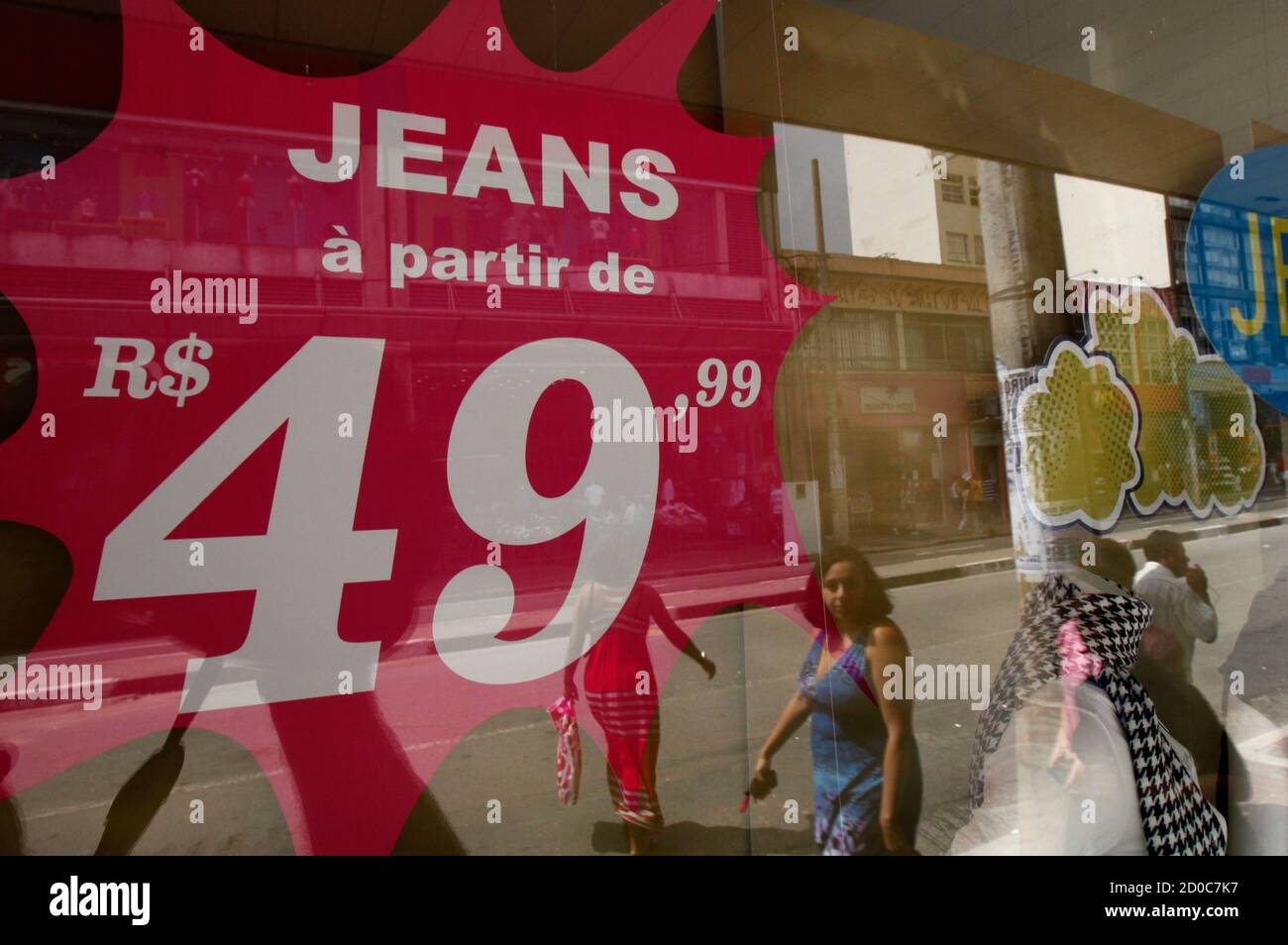 A store selling jeans displays prices in real, Brazil's currency, in Sao  Paulo April 8, 2011. Brazil's real has surged more than 2 percent against  the U.S. dollar this week as the