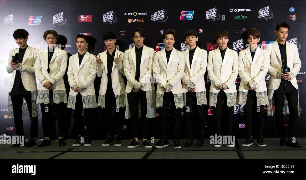 South Korean K-pop group Exo meet reporters backstage after winning the  Album of the Year award at the 2014 Mnet Asian Music Awards (MAMA) in Hong  Kong December 4, 2014. REUTERS/Tyrone Siu (