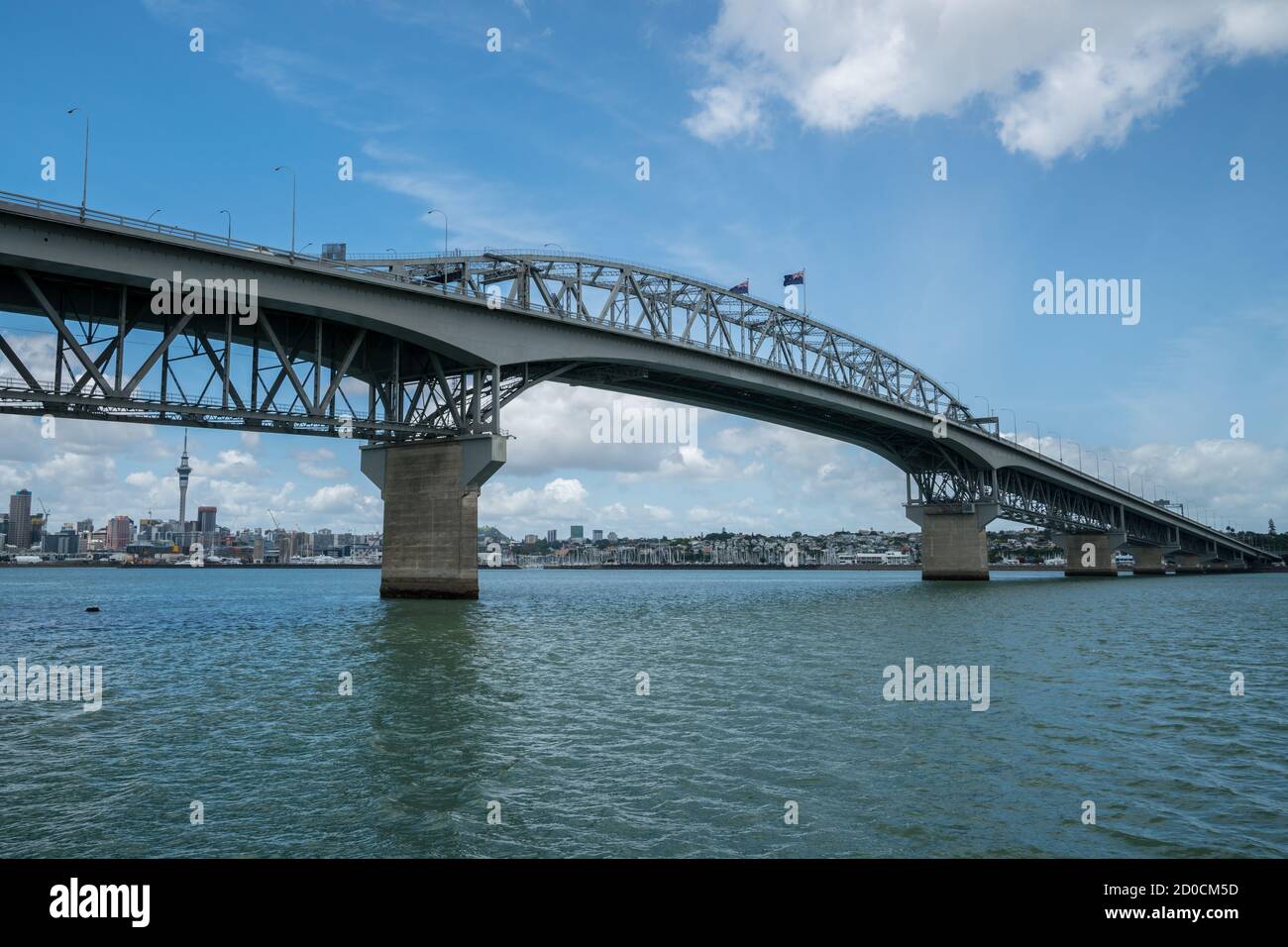 Auckland Harbour Bridge in Auckland, New Zealand, shot from Northcote Point. The bridge joins St Marys Bay on the Auckland city side with Northcote on Stock Photo
