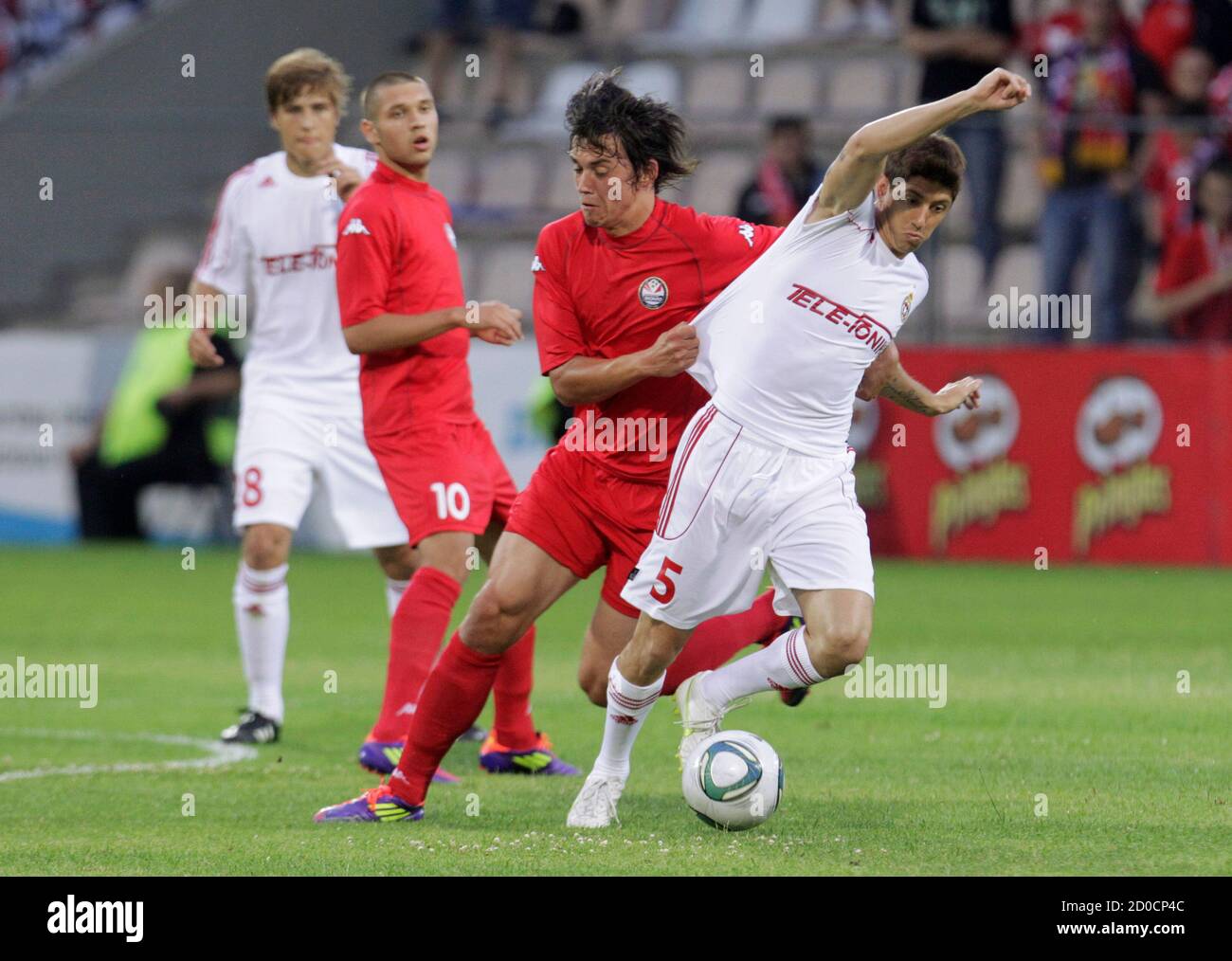 Maor Melikson R Of Wisla Krakow Fights For The Ball With Igors Tarasovs Of Fc Skonto During Their Champions League Second Qualifying Round Match In Riga July 13 2011 Reuters Ints Kalnins Latvia