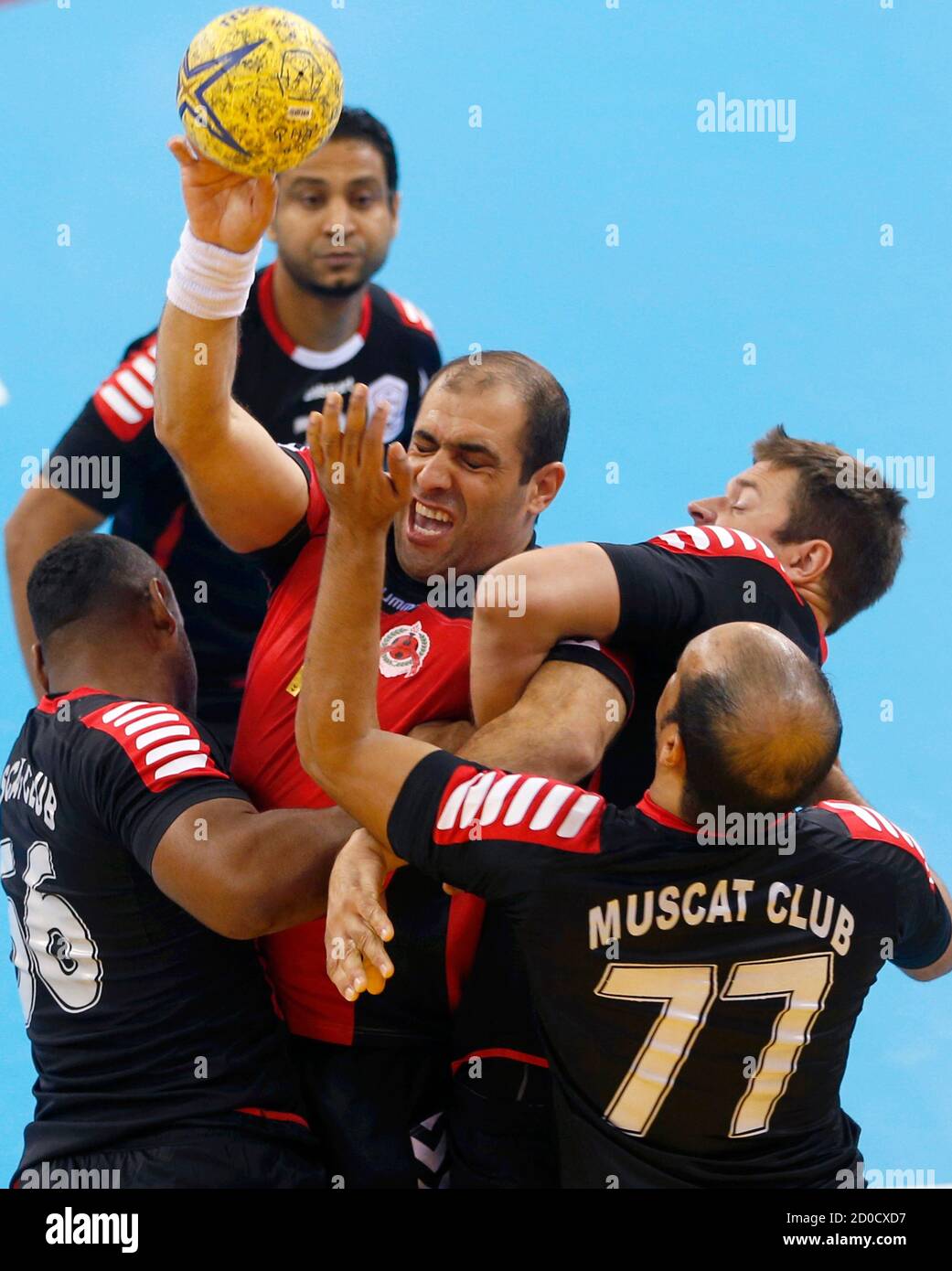 Bassel Al Rayes C Of Qatar S Al Rayyan Tries To Score Against Abdullah Al Dughaishi 77 Nasser Al Tamtami L And Peter Rook Of Oman S Muscat During The Asian Handball Club Championship In