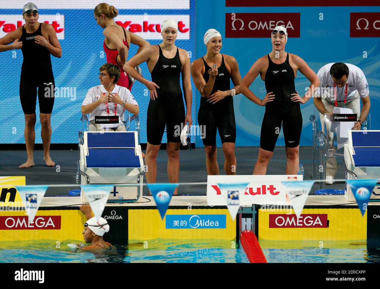 U S Team Olivia Smoliga Laura Sogar Christine Magnuson And Lia Neal Look At The Scoreboard After