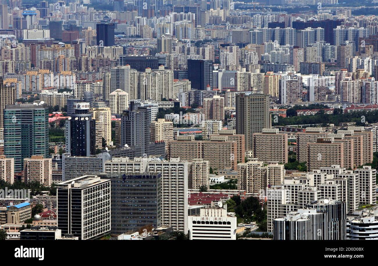 A general view of buildings in Beijing, July 3, 2013. The pace of China's month-on-month home price rise edged down slightly for a third straight month in June though the year-on-year gains were the strongest this year, underlining the challenges facing Beijing's near four-year-old campaign to tame housing inflation. Picture taken July 3, 2013. REUTERS/Jason Lee (CHINA - Tags: POLITICS REAL ESTATE BUSINESS) Stock Photo