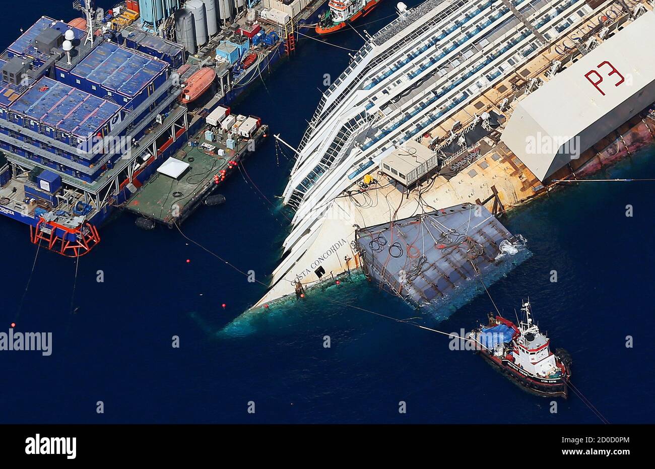 An Aerial View Shows The Costa Concordia As It Lies On Its Side Next To Giglio Island Taken From An Italian Navy Helicopter August 26 2013 The Wrecked Costa Concordia Cruise Ship