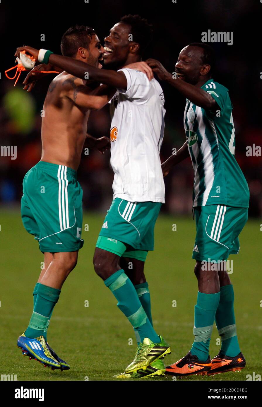 Raja Casablanca Players Dance With Jersey And The Shoes Of Atletico Mineiro S Ronaldinho After Their Fifa Club World Cup Semi Final Soccer Match At Marrakech Stadium December 18 13 Rank Outsiders Raja Casablanca