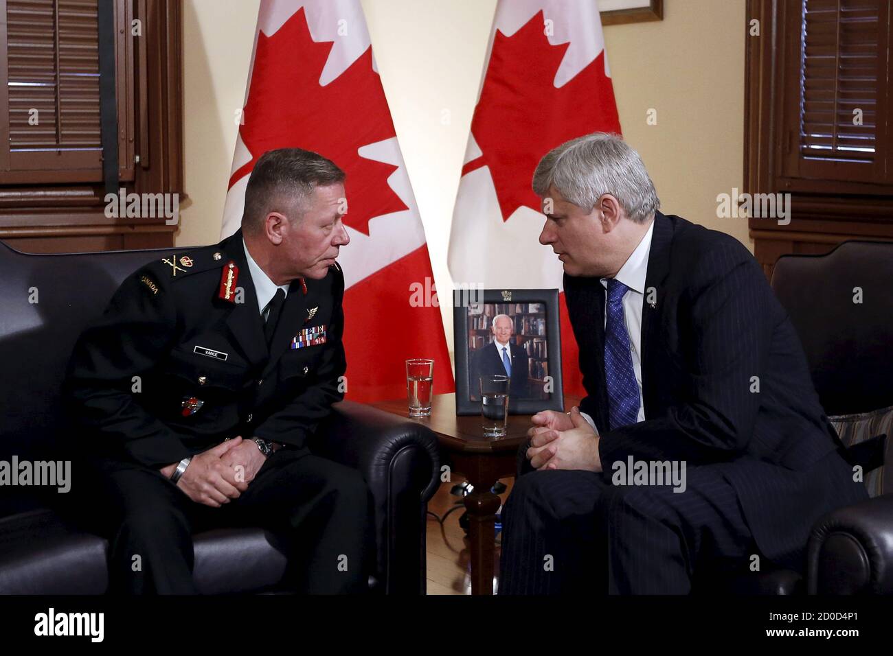 Canada S Prime Minister Stephen Harper R Talks With Lieutenant General Jonathan Vance In Harper S Langevin Block