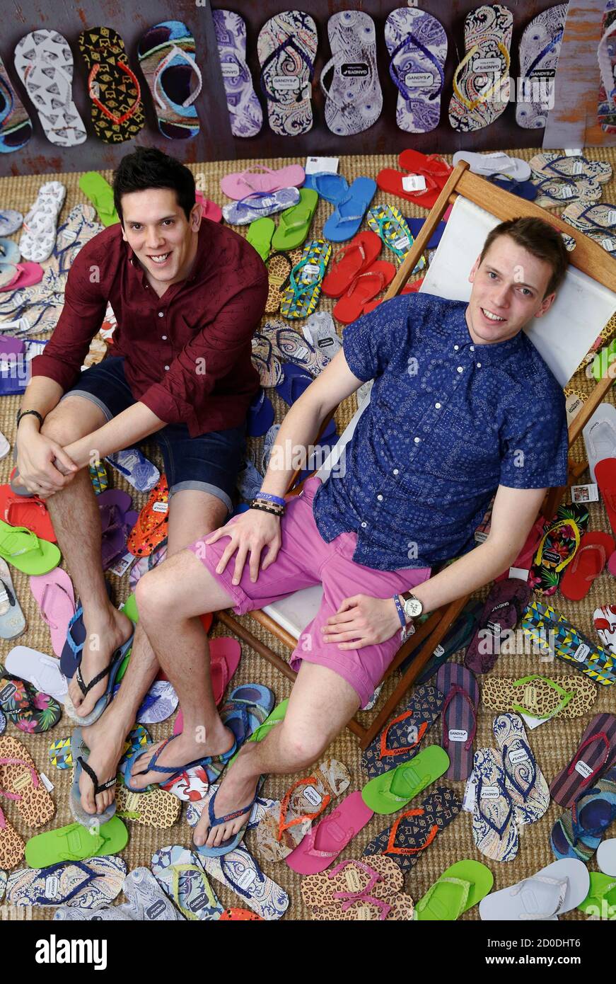 Brothers Rob (L) and Paul Forkan, creators of Gandys flip-flops, pose for a  photograph at their offices in London December 19, 2014. When British  brothers Rob and Paul Forkan survived the Indian