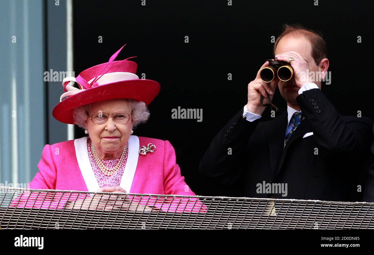 britains-queen-elizabeth-l-and-prince-edward-watch-the-winners-enclosure-after-her-horse-lost-in-the-epsom-derby-at-epsom-racecourse-in-southern-england-june-4-2011-reuterssuzanne-plunkett-britain-tags-sport-horse-racing-society-royals-images-of-the-day-2D0DN85.jpg
