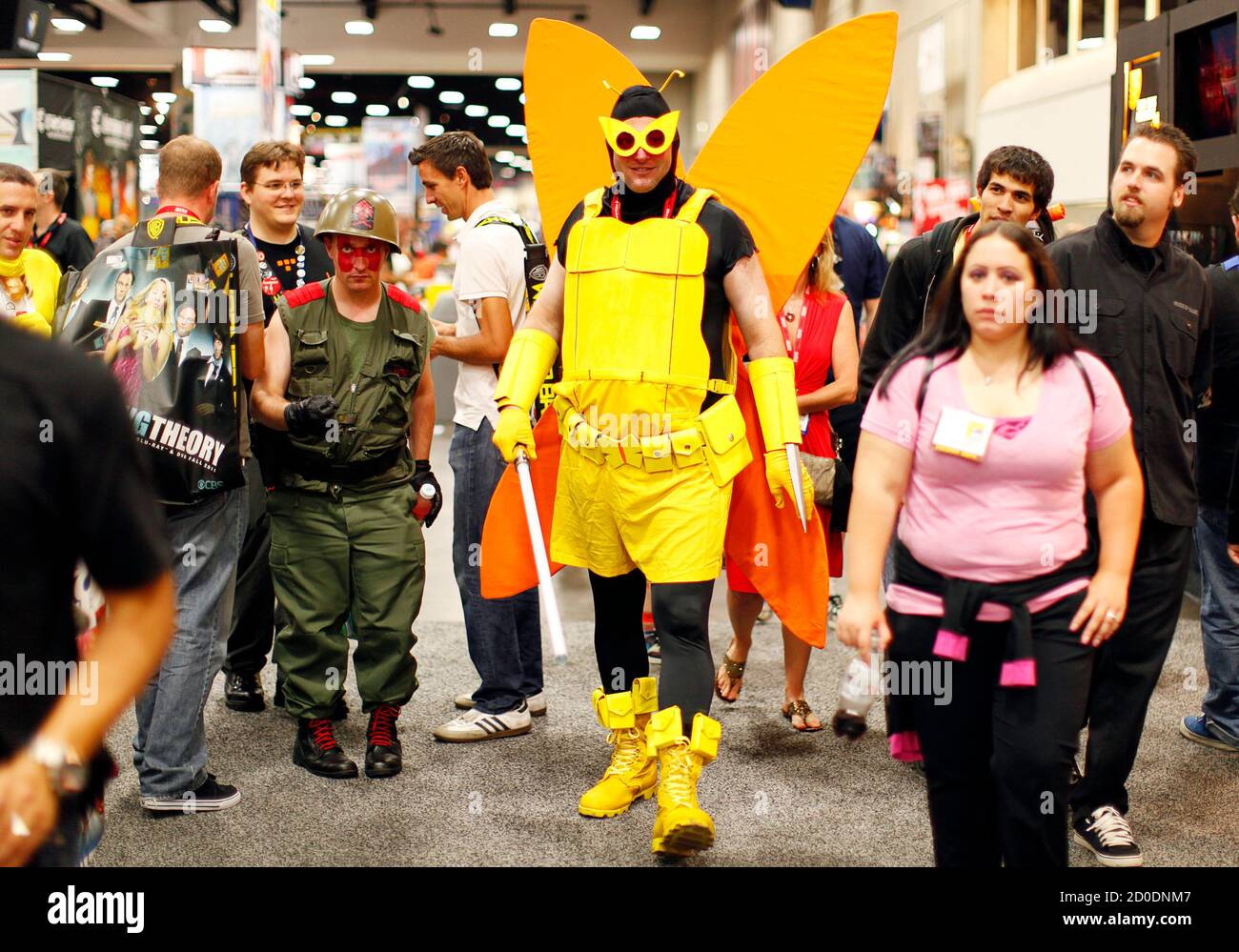 An attendee dressed in costume walks the Comic Con convention floor during the pop culture event in San Diego, California July 22, 2011.  REUTERS/Mike Blake (UNITED STATES - Tags: ENTERTAINMENT SOCIETY) Stock Photo