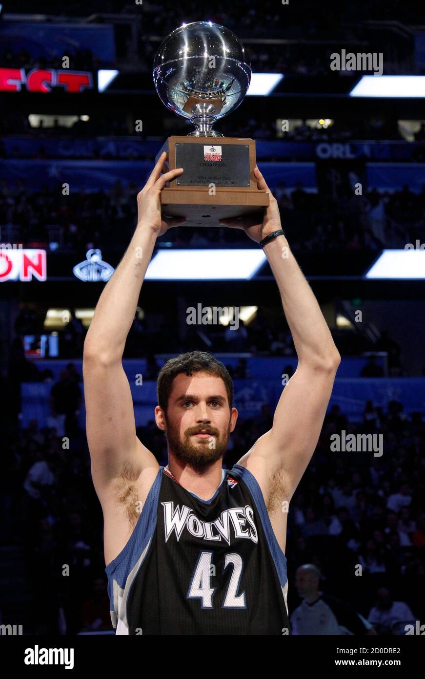 kevin-love-of-the-minnesota-timberwolves-holds-the-trophy-after-winning-the-three-point-contest-during-the-nba-all-star-weekend-in-orlando-florida-february-25-2012-reutersjeff-haynes-united-states-tags-sport-basketball-2D0DRE2.jpg